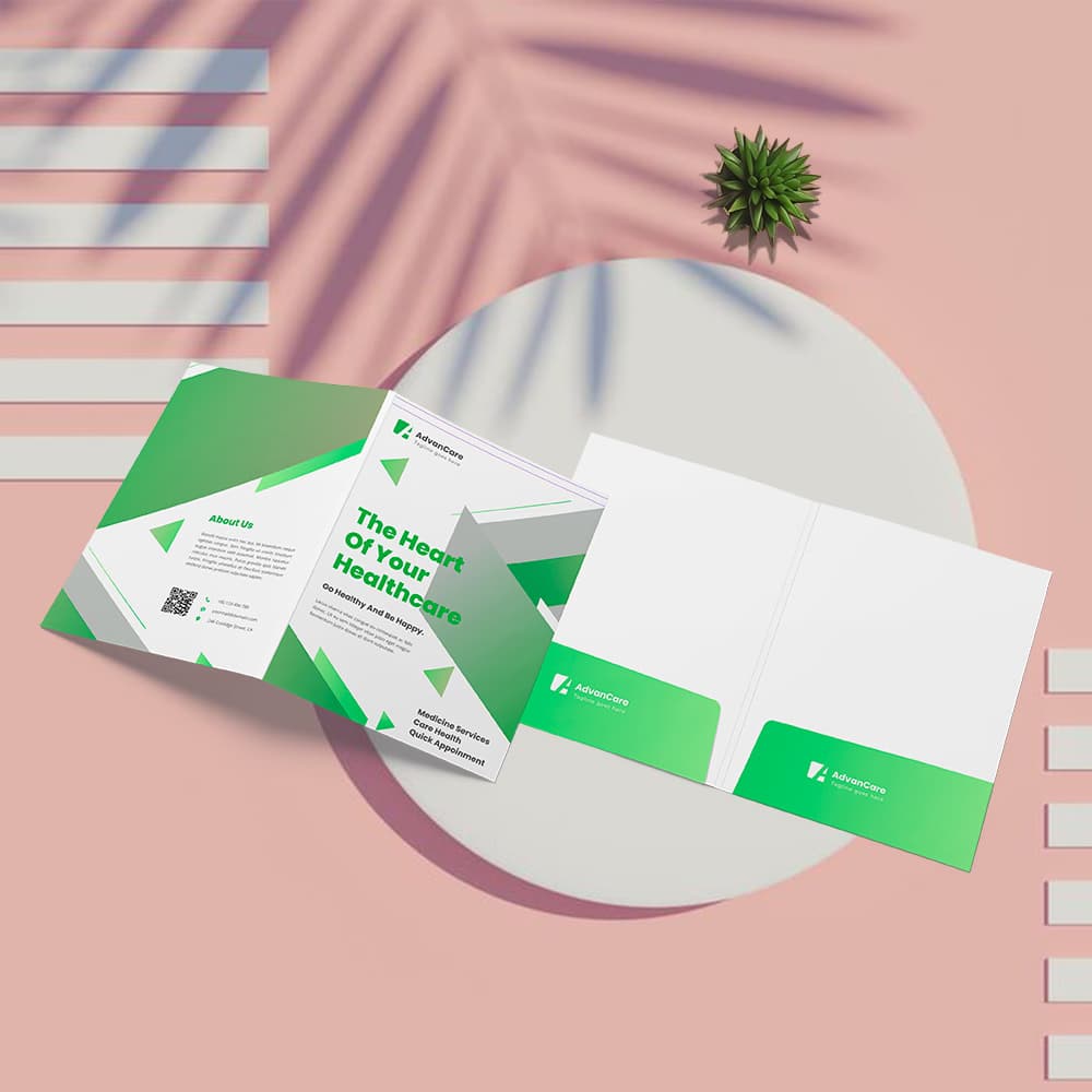 An eye-level shot displays green Presentation Folders and presentation folders with logo on a pink surface with plant shadows.