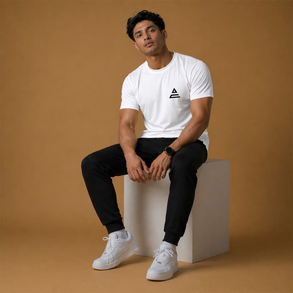 white wearing yellow crew neck t shirt sitting in casual pose