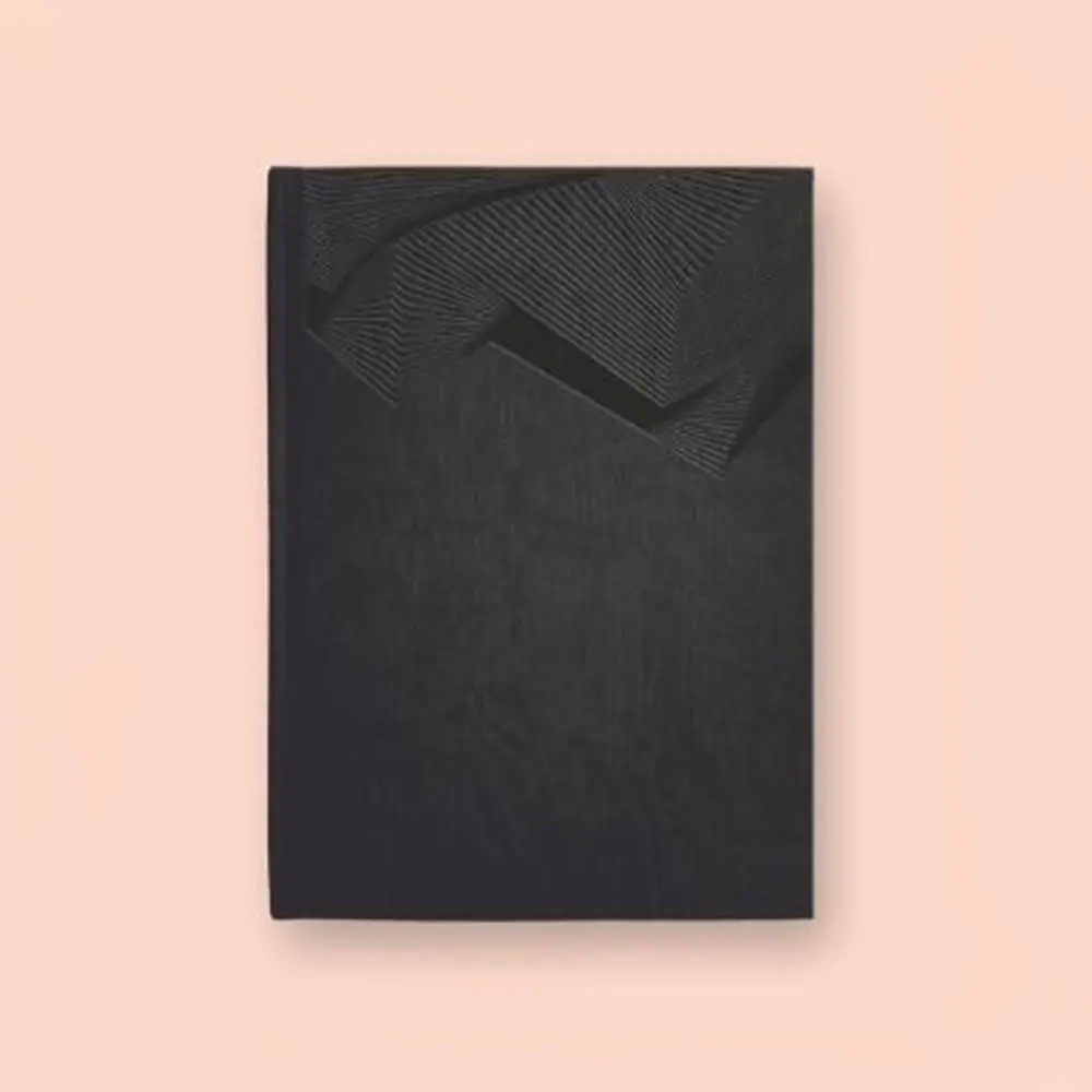 The notebook is closed, with visible ruled lines peeking through the cover, highlighting its personalized and portable design. Personalised A5 Diary