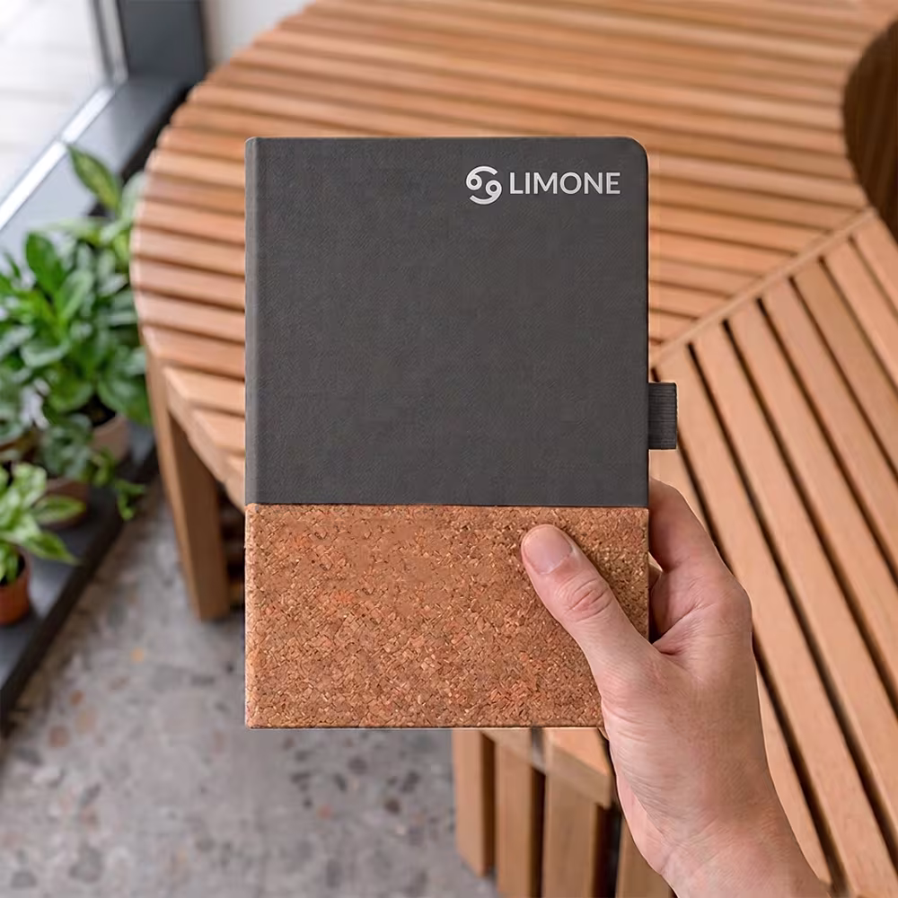 Urban Cork Diary featuring a natural cork lower panel and sleek black finish, personalized with a logo for a stylish, eco-friendly diary.