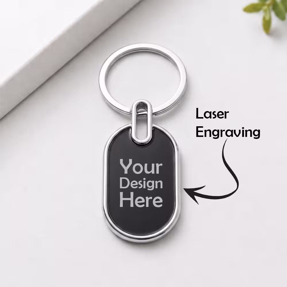 oval metal keychain with laser engraving design shown