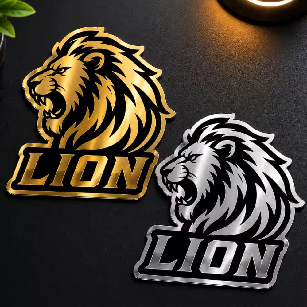Premium gold and silver metallic vinyl lion logo sticker with die-cut finish.