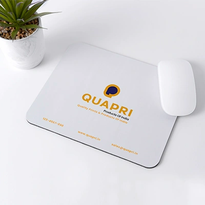 "Custom mouse pad with family photo displayed on a desk