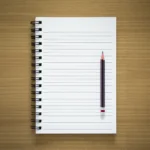 Open A4 notebook with lined pages.