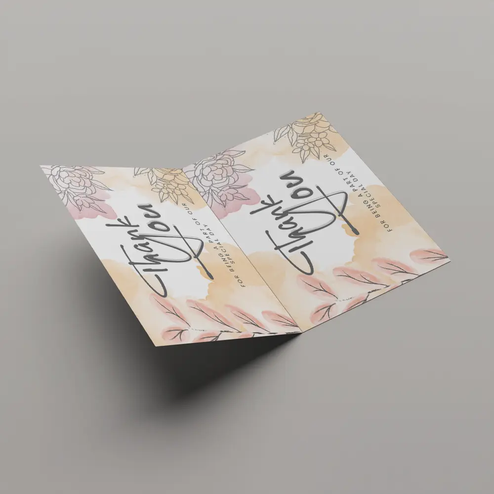 Graceful thank you card with intricate design.