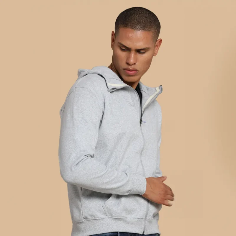 Grey zip-up hoodie with a front zipper, pockets, and a hood with drawstrings