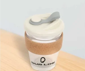 Clear glass coffee mug featuring an eco-friendly cork handle