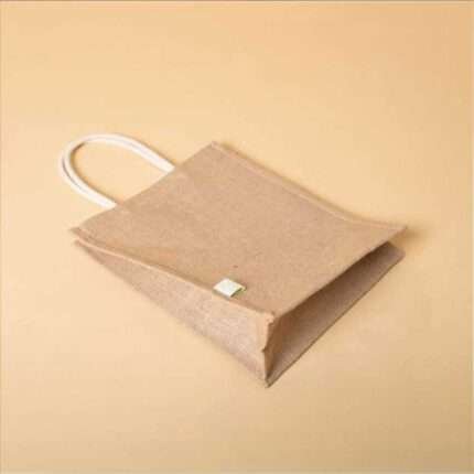 Quapri Jute Bag with Zip – Elegant and durable tote made from 100% natural jute, featuring a convenient zip closure and spacious design. Ideal for eco-friendly shopping and versatile daily use."