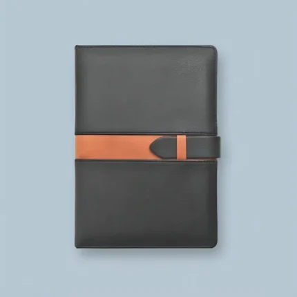 Flat lay of a premium A5 leather journal with a rich, textured cover.