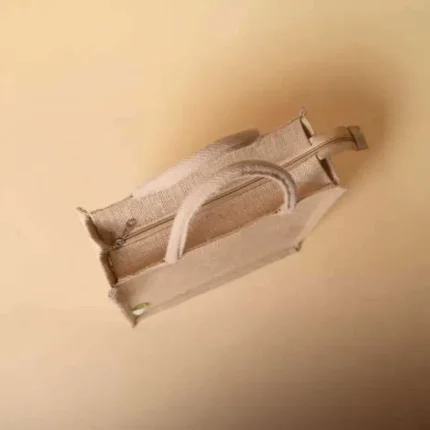 Gemini said Top-down view of a tan jute shopping bag featuring a secure zipper closure and two matching woven handles.