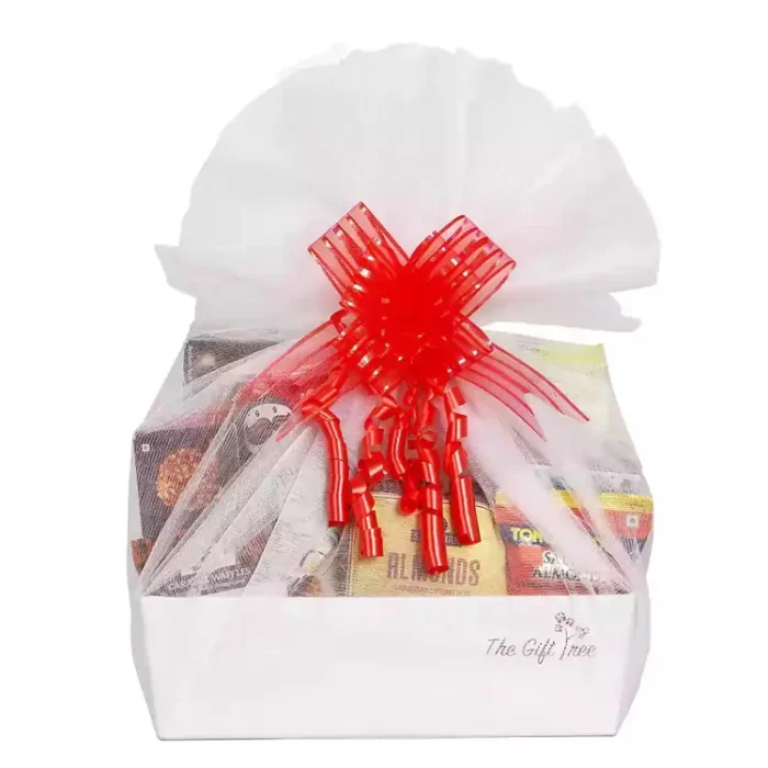 Sumptuous Luxury Gourmet Chocolate & Snack Gift Hamper featuring a rich selection of indulgent items like chocolate popcorn, sugar-free Belgian dark chocolate with fruits and nuts, and crunchy peanut butter, elegantly presented in a golden gift basket with a striking red ribbon