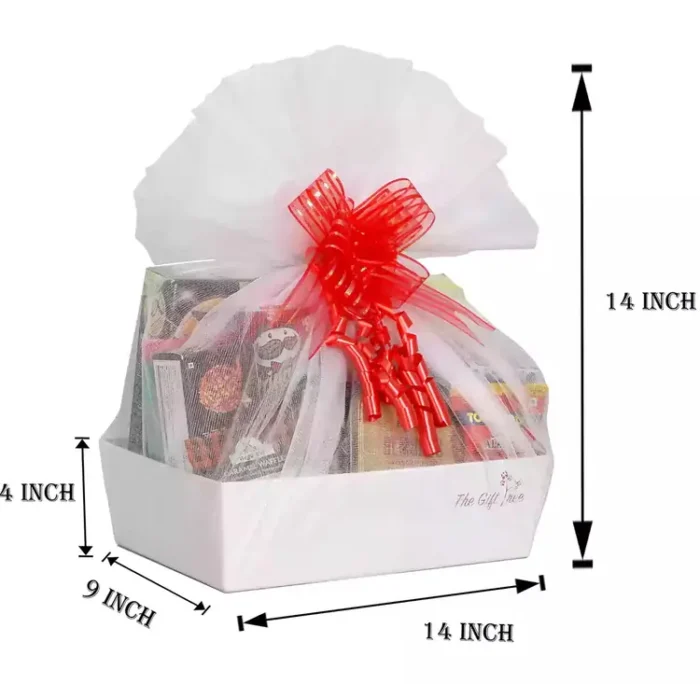 Decadent Luxury Gourmet Chocolate & Snack Gift Hamper offering a delightful mix of treats, including waffle chips, healthy jowar pops, refreshing mixed fruit juice, and premium almond sticks, all artfully arranged in a golden basket adorned with a cheerful red bow