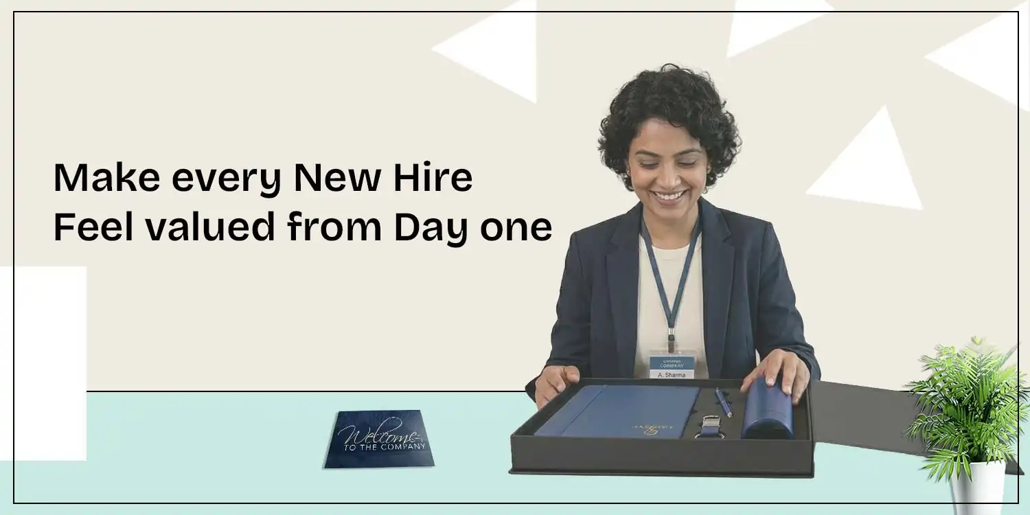 Woman opening a blue corporate gift box, showing premium employee welcome pack ideas like a notebook and bottle.