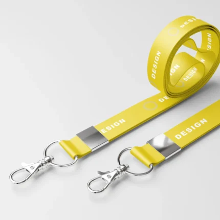 Yellow custom-printed lanyards with "DESIGN" text.