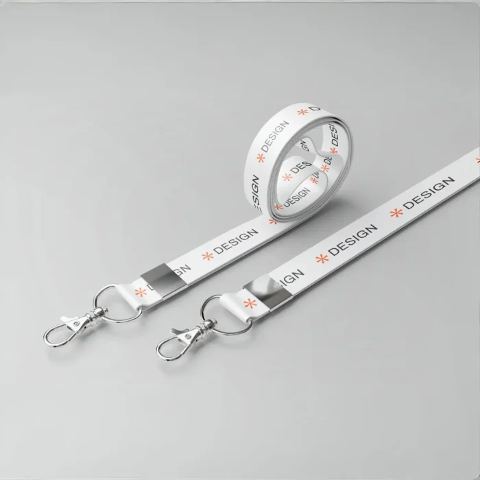 Custom white lanyard with side lever hook, metal clasp, printed ‘DESIGN’ text with orange icon—perfect for office or events.