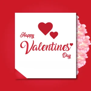 A Valentine's Day poster with "Happy Valentine's Day" written in red cursive on a white card, decorated with two red hearts. The background is red with pink flowers on the side, creating a romantic theme.