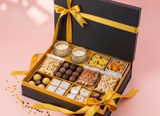 Luxury festive hamper gift box with dry fruits, chocolates, sweets, and candles, perfect for Best Corporate Gifting Ideas during celebrations.