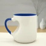 Blue ceramic custom mug with heart-shaped handle