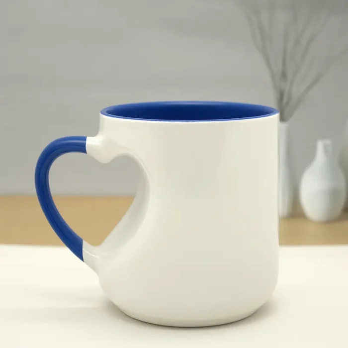 Blue ceramic custom mug with heart-shaped handle