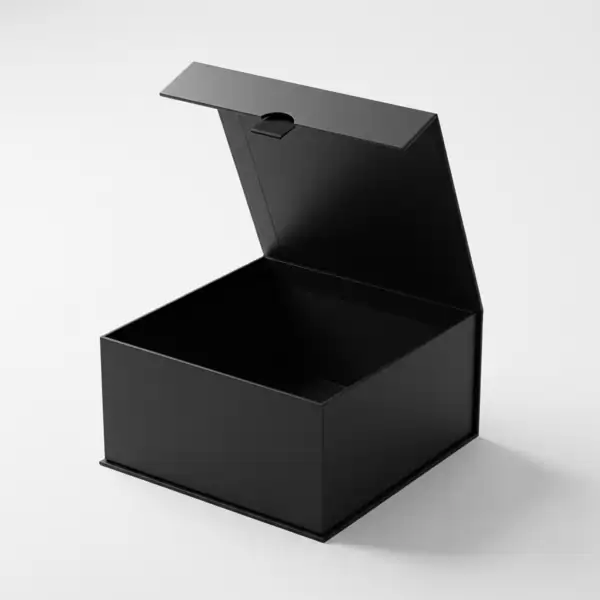 Open black rigid cardboard gift box with magnetic flip-top lid, matte finish, sharp edges, on white background, soft shadows. Luxurious.