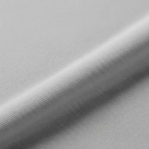 A light gray cotton-polyester blend fabric with a soft, smooth texture, ideal for Personalized T-Shirt Printing that needs durability and comfort.