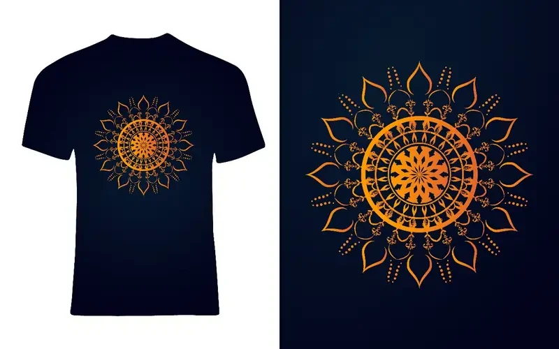 A mock-up showing a black T-shirt and a close-up of its design: an intricate, golden-orange mandala pattern. Best T-shirt Design Ideas.