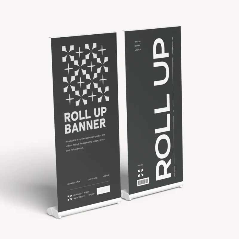 Two black vertical roll-up banners with white geometric patterns and "ROLL UP BANNER" text in a minimalist mockup style