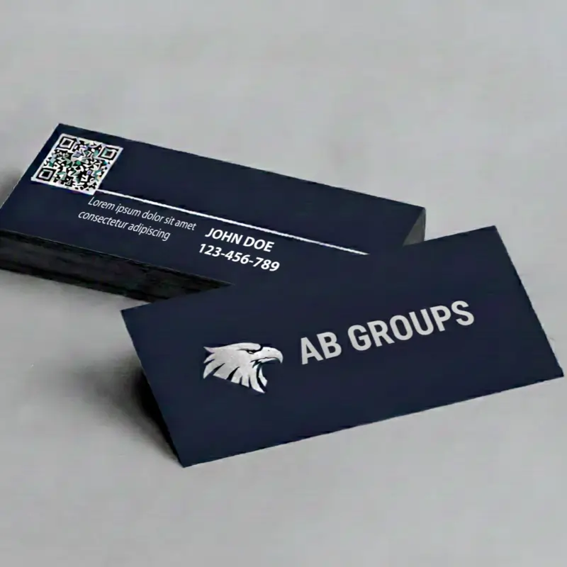 Professional navy blue types of business cards for AB GROUPS featuring a silver eagle logo and integrated QR code.
