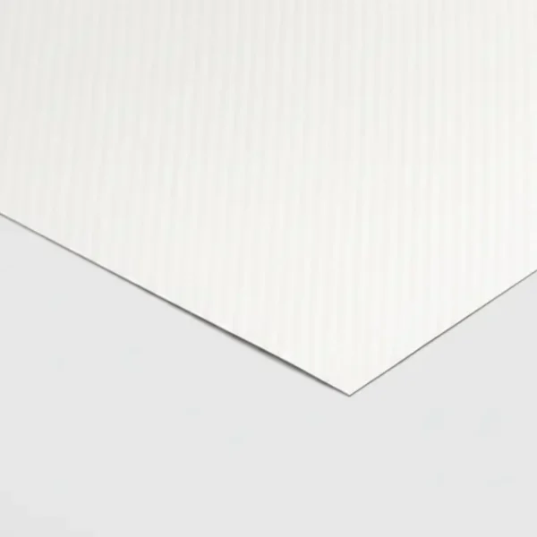 White textured cardstock sheet with subtle lines, illustrating premium finishes among types of paper for printing.